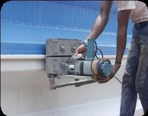 Seaming machine joining panels